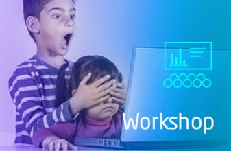 A boy is shocked and covers the eyes of a girl to protect her to from the inappropriate content on the laptop screen