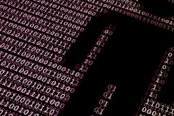 Binary code with a man's silhouette.