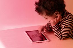 A child using a tablet.