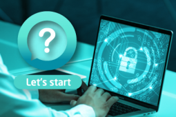 A padlock is seen on screen of a man's computer