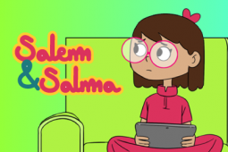 A sad girl holding a tablet.