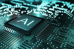 A representation of artificial intelligence by showing a computer chip with the abbreviation AI on it.