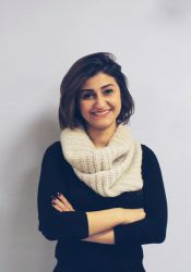Nour Jurdi posing for the picture, arms crossed.